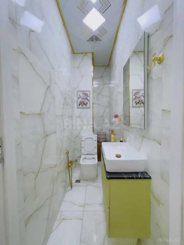 Satılır 4 otaqlı mənzil 128 m²