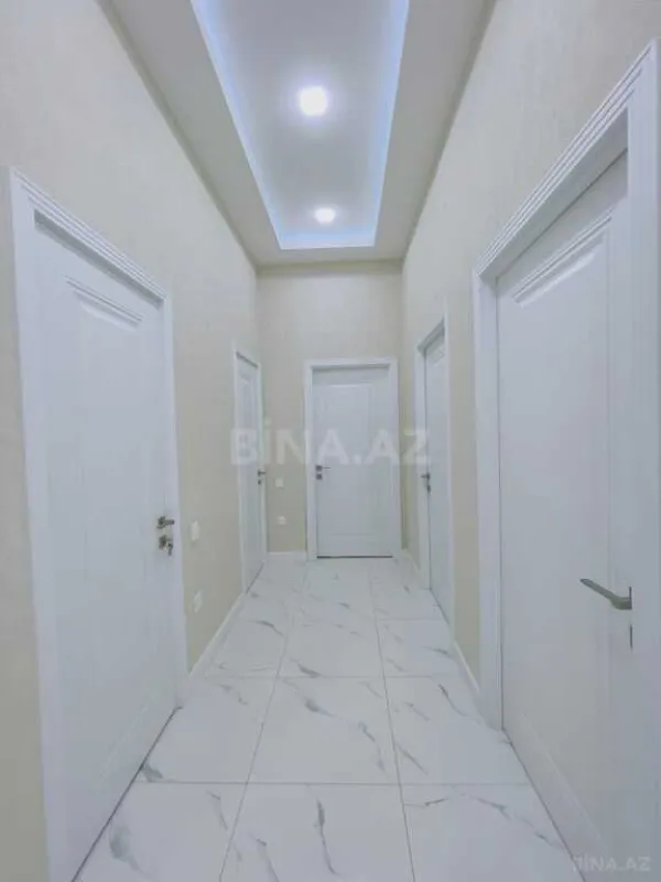 Satılır 4 otaqlı mənzil 128 m²
