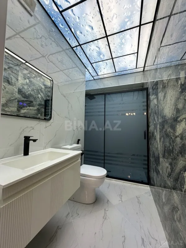 Satılır 4 otaqlı mənzil 155 m²