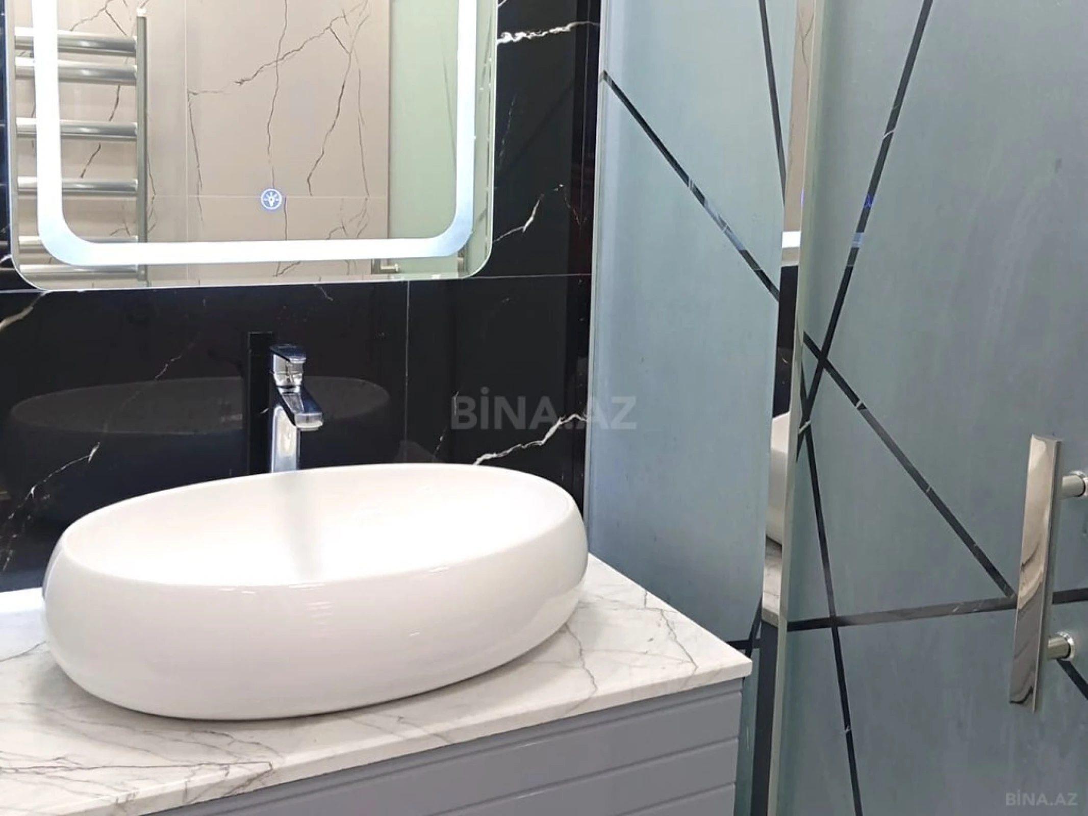 Satılır 3 otaqlı mənzil 106.6 m²