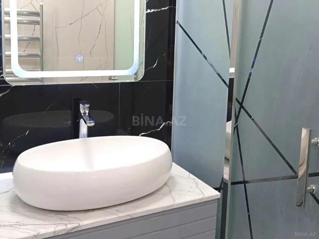 Satılır 3 otaqlı mənzil 106.6 m²