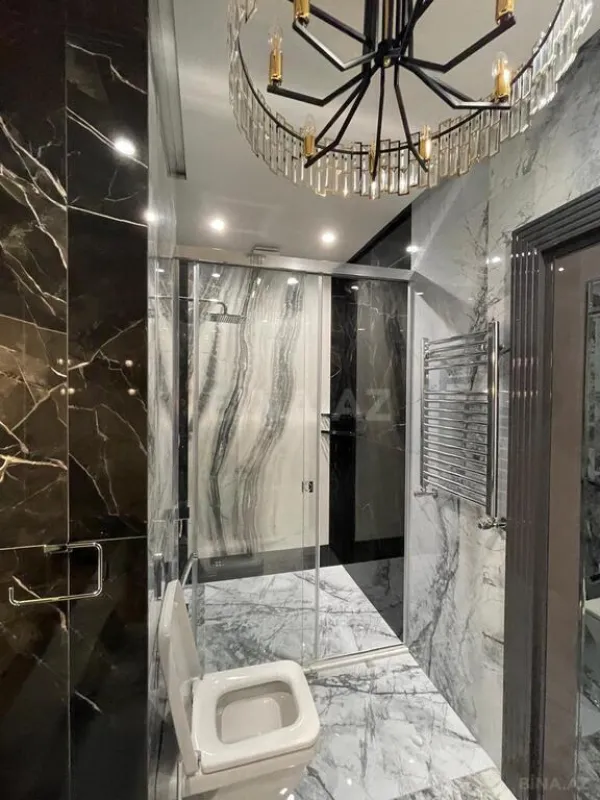 Satılır 4 otaqlı mənzil 210 m²