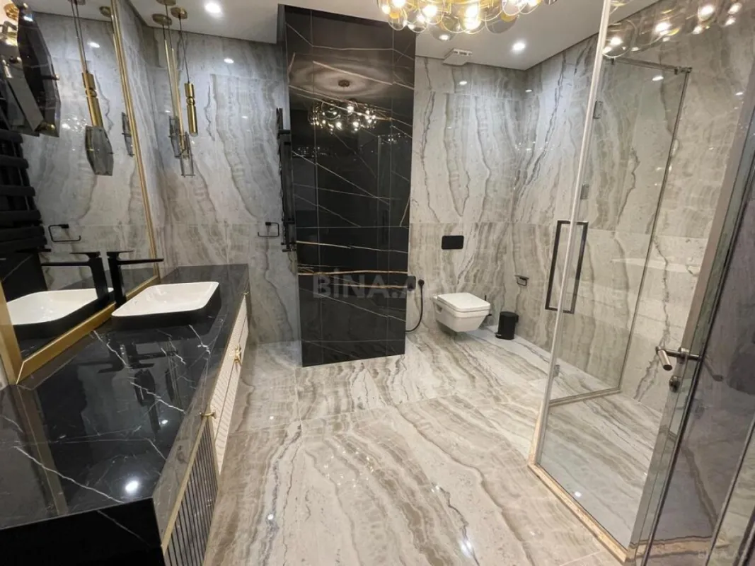 Satılır 4 otaqlı mənzil 210 m²