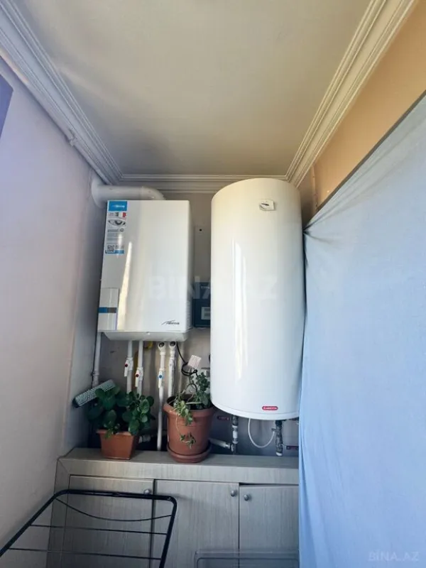 Satılır 4 otaqlı mənzil 142 m²