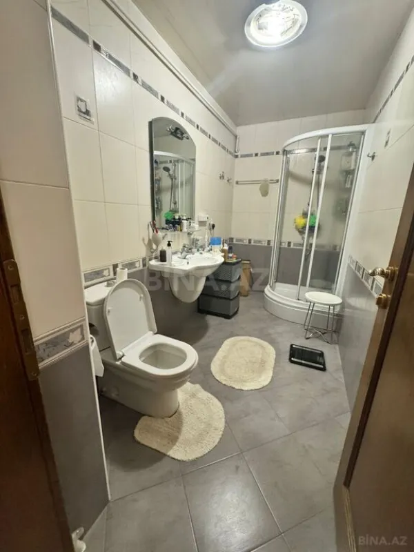 Satılır 4 otaqlı mənzil 142 m²