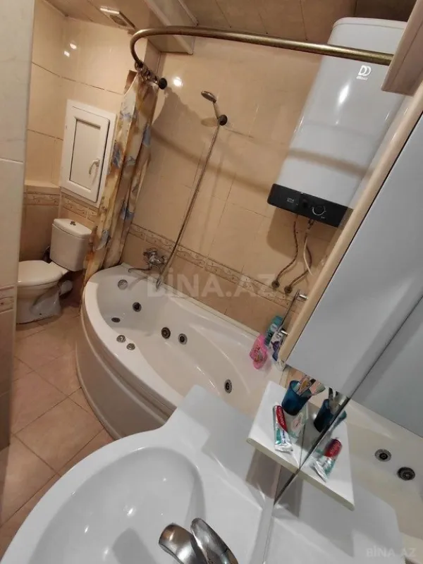 Satılır 4 otaqlı mənzil 100 m²