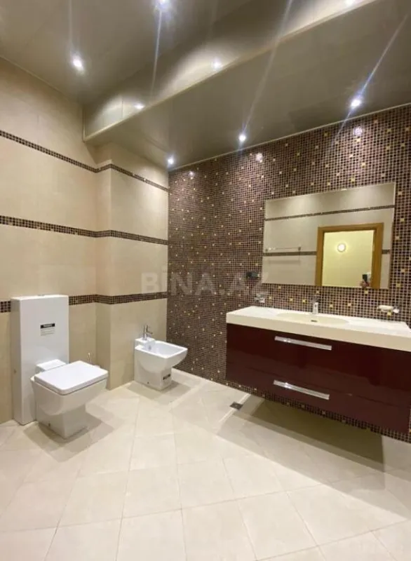 Satılır 4 otaqlı mənzil 215 m²
