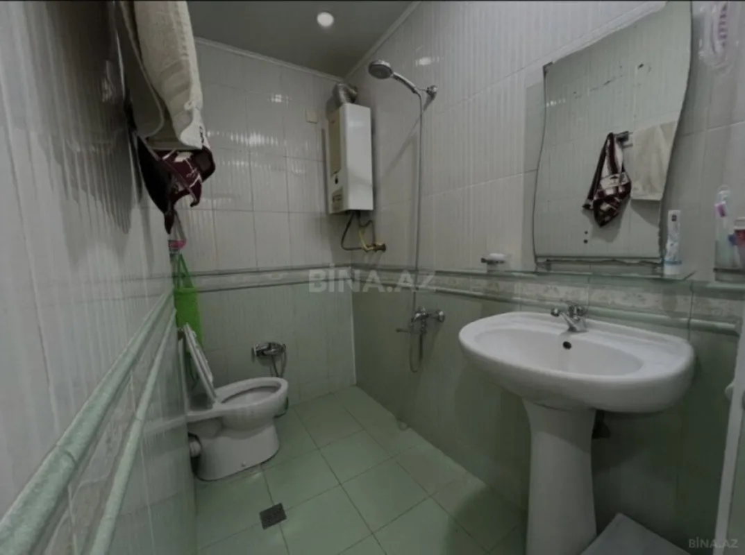 Satılır 4 otaqlı mənzil 115 m²