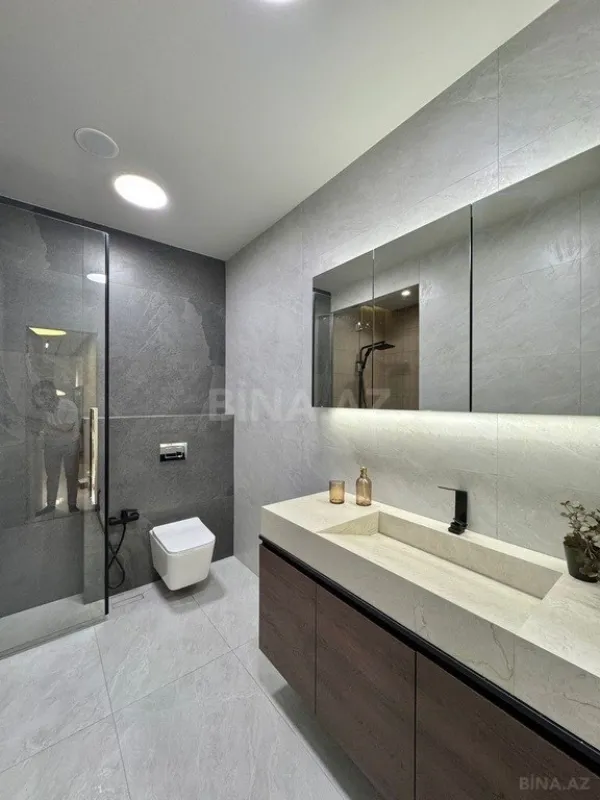 Satılır 3 otaqlı mənzil 148 m²