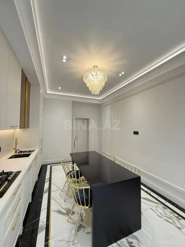 Satılır 4 otaqlı mənzil 155 m²