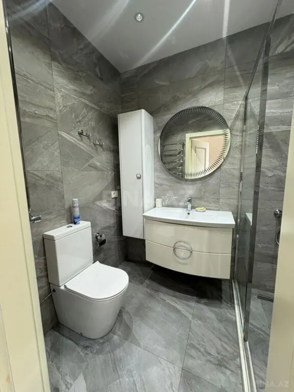 Satılır 4 otaqlı mənzil 147 m²