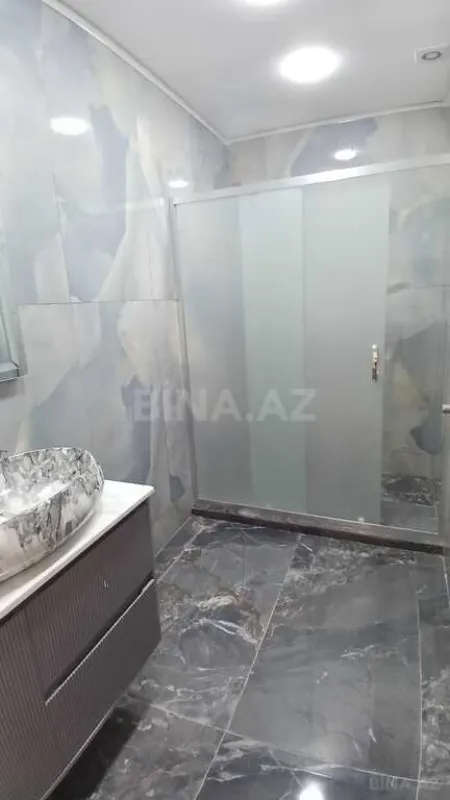 Satılır 4 otaqlı mənzil 178 m²