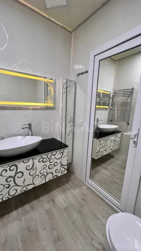 Satılır 4 otaqlı mənzil 165 m²