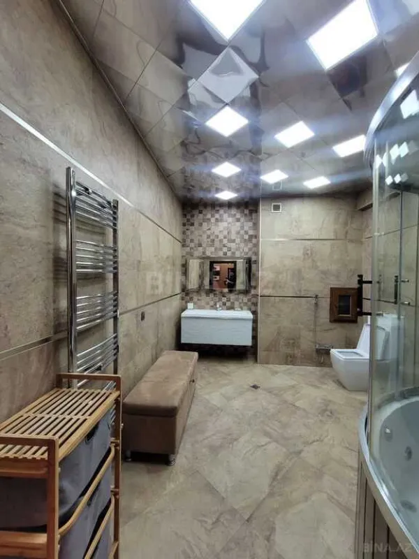 Satılır 4 otaqlı mənzil 238 m²