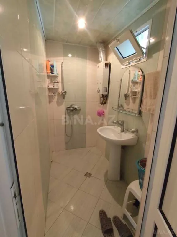 Satılır 4 otaqlı mənzil 107 m²