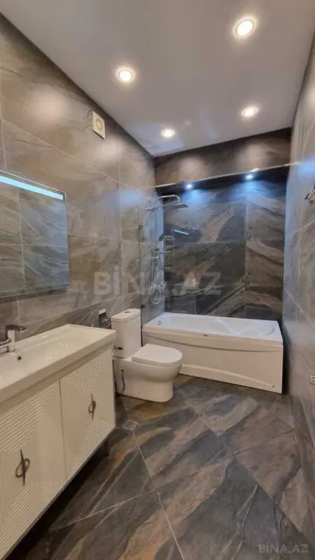 Satılır 4 otaqlı mənzil 195 m²