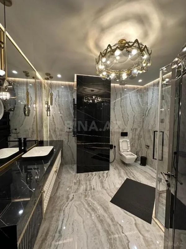 Satılır 4 otaqlı mənzil 220 m²