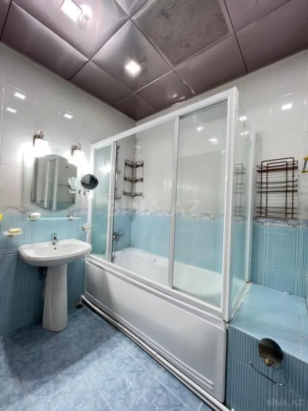 Satılır 4 otaqlı mənzil 210 m²