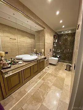 Satılır 4 otaqlı mənzil 151 m²