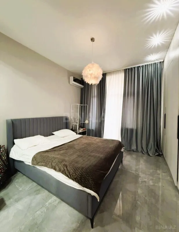 Satılır 2 otaqlı mənzil 103 m²