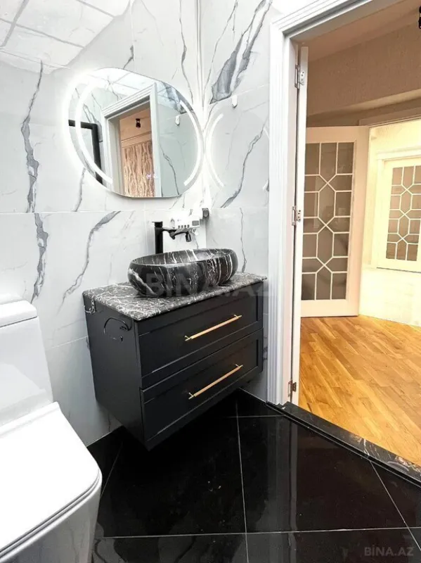 Satılır 4 otaqlı mənzil 155 m²