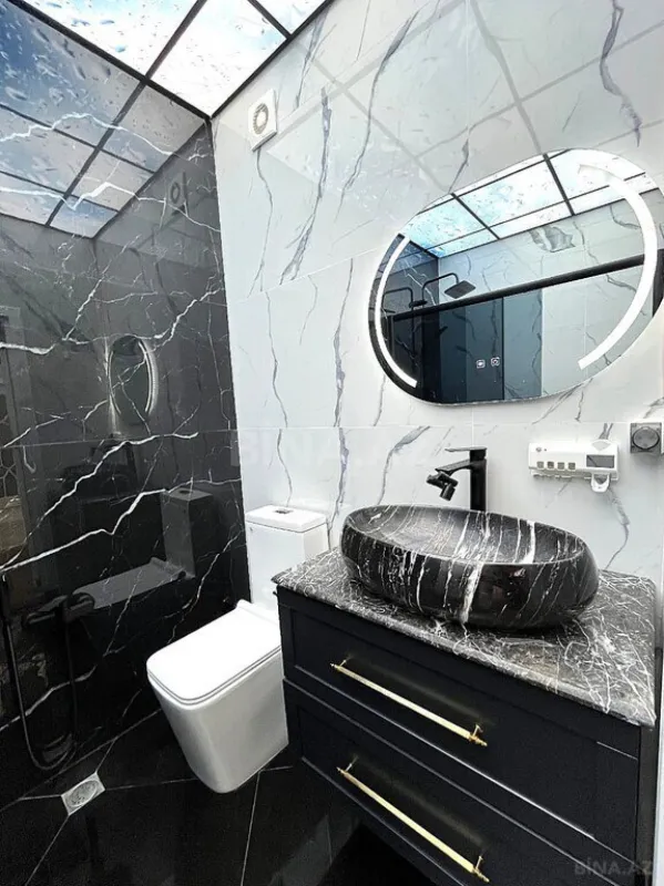 Satılır 4 otaqlı mənzil 155 m²