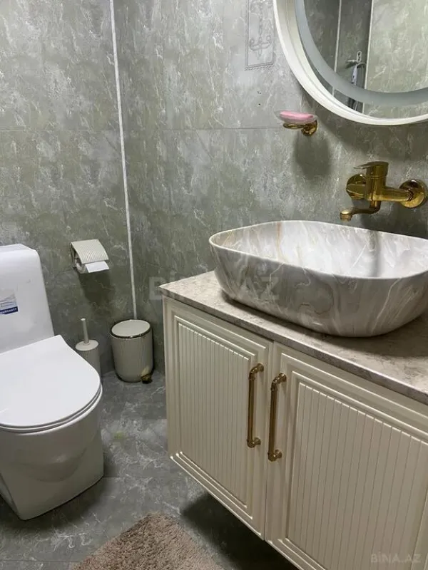 Satılır 4 otaqlı mənzil 156 m²