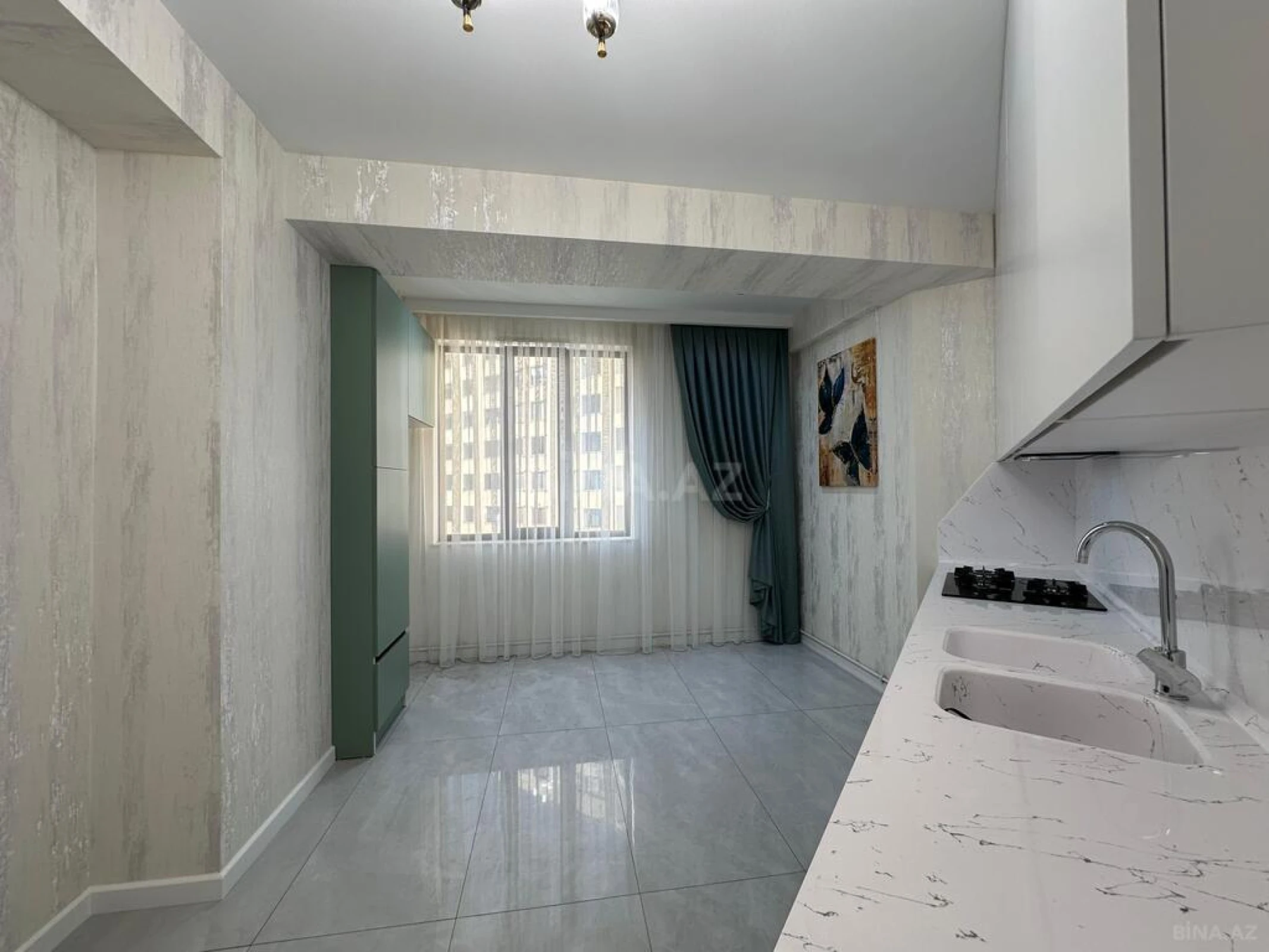 Satılır 3 otaqlı mənzil 107 m²