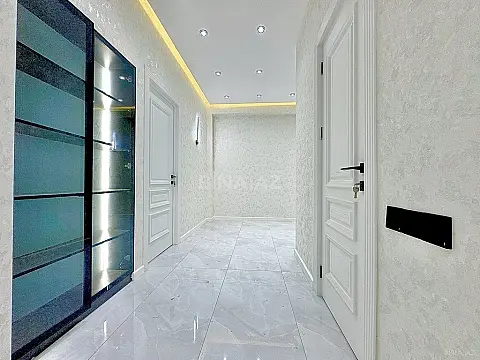Satılır 4 otaqlı mənzil 127 m²