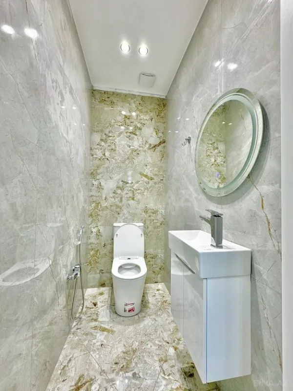 Satılır 4 otaqlı mənzil 127 m²