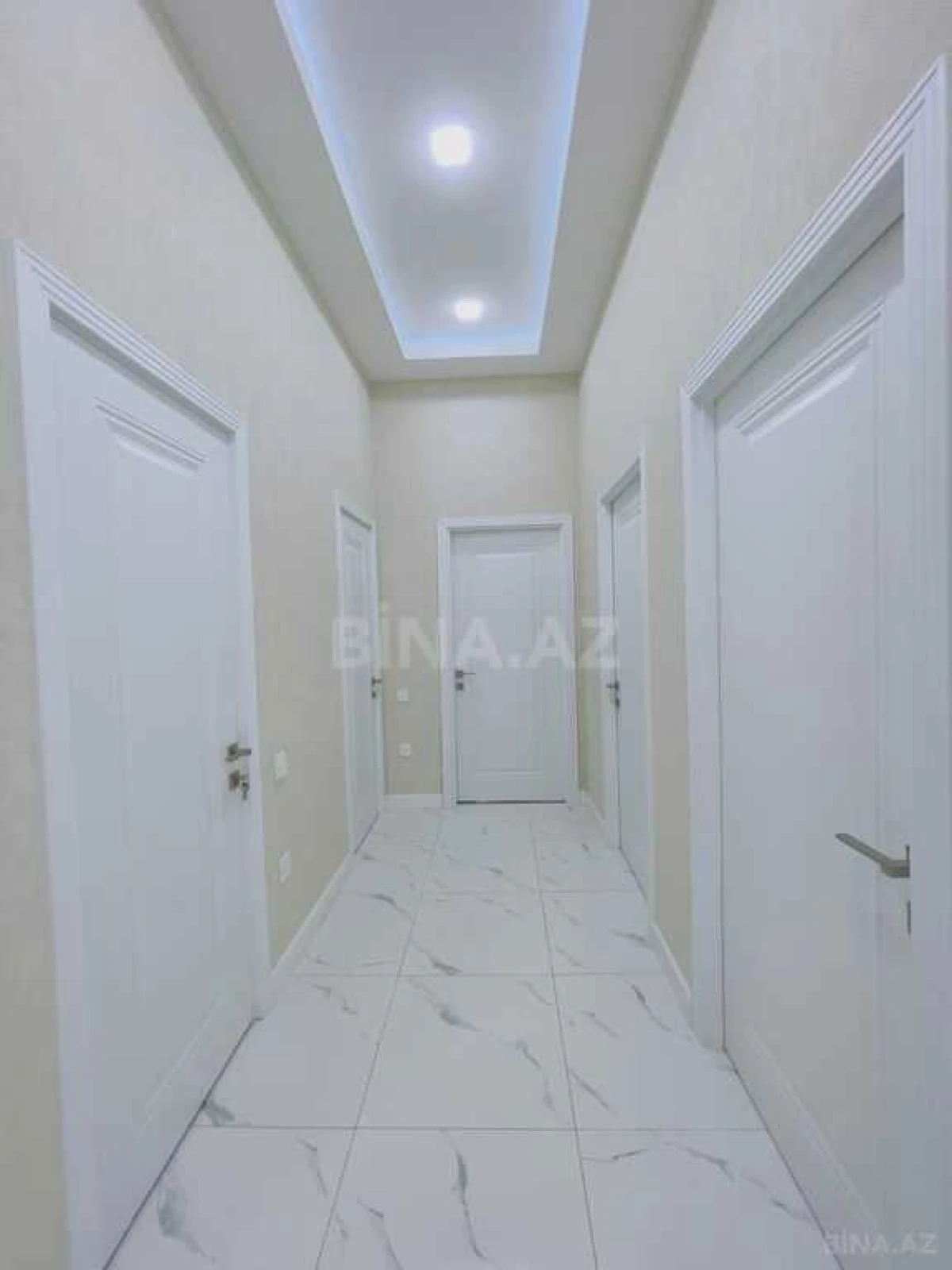 Satılır 4 otaqlı mənzil 129 m²