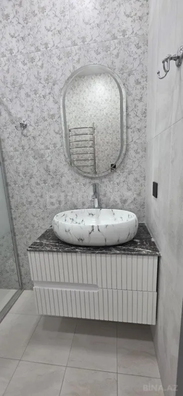 Satılır 3 otaqlı mənzil 136 m²