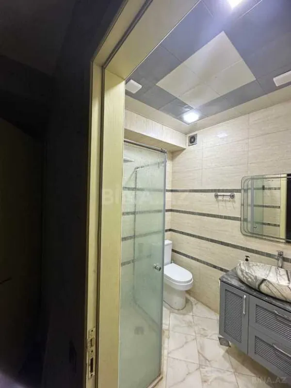 Satılır 4 otaqlı mənzil 127 m²