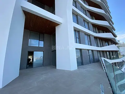 Satılır 4 otaqlı mənzil 303 m²