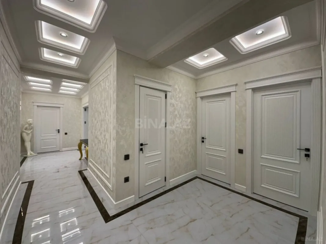 Satılır 4 otaqlı mənzil 144 m²