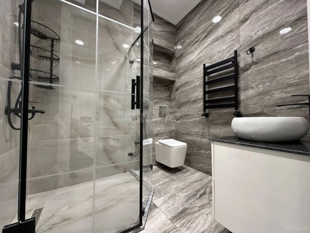 Satılır 4 otaqlı mənzil 144 m²