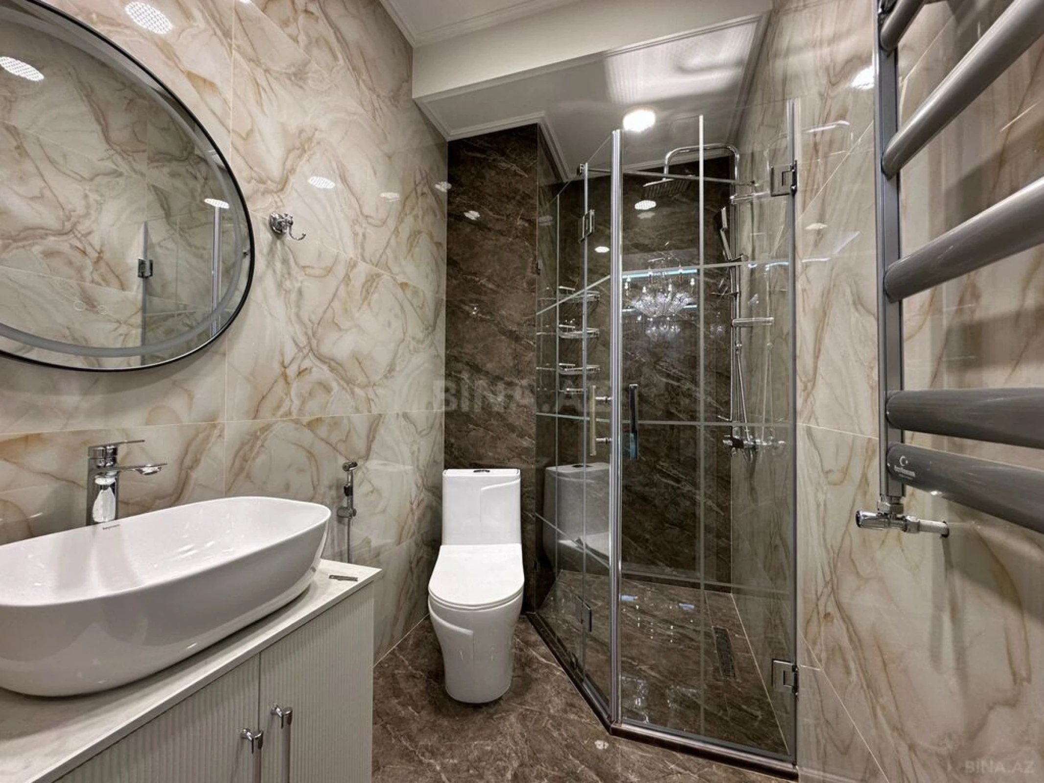 Satılır 4 otaqlı mənzil 144 m²