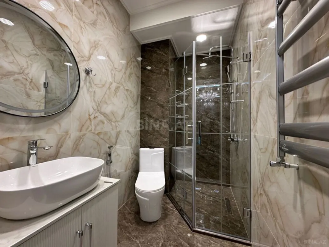 Satılır 4 otaqlı mənzil 144 m²