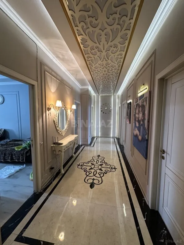 Satılır 4 otaqlı mənzil 148 m²