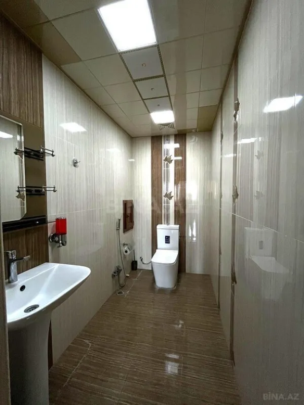 Satılır 4 otaqlı mənzil 164 m²