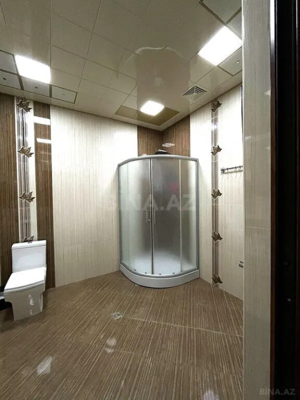 Satılır 4 otaqlı mənzil 164 m²