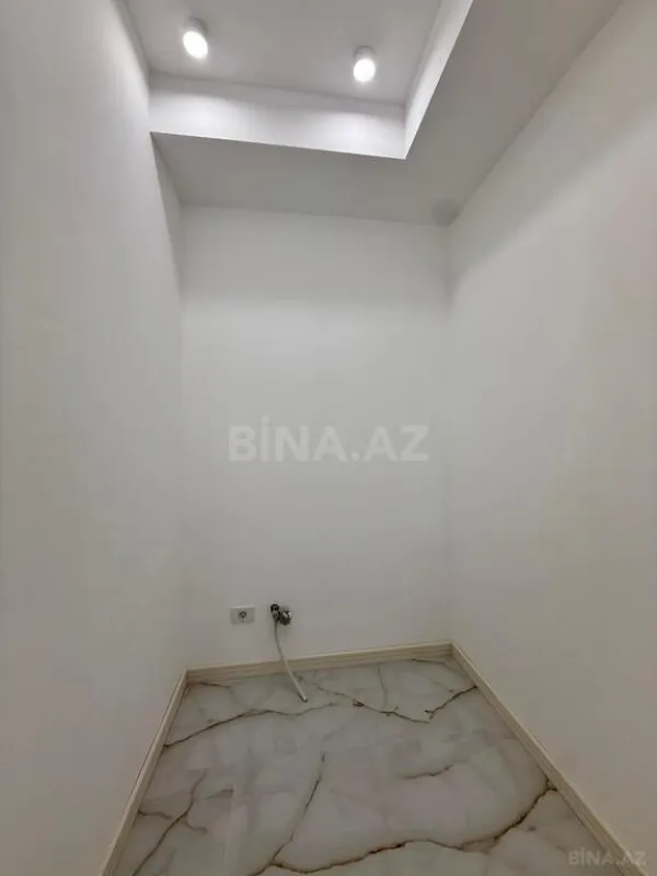Satılır 3 otaqlı mənzil 129 m²
