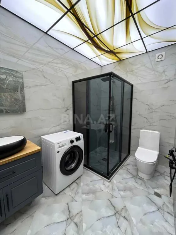 Satılır 4 otaqlı mənzil 155 m²