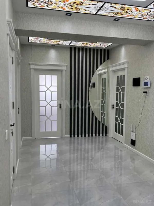 Satılır 4 otaqlı mənzil 155 m²