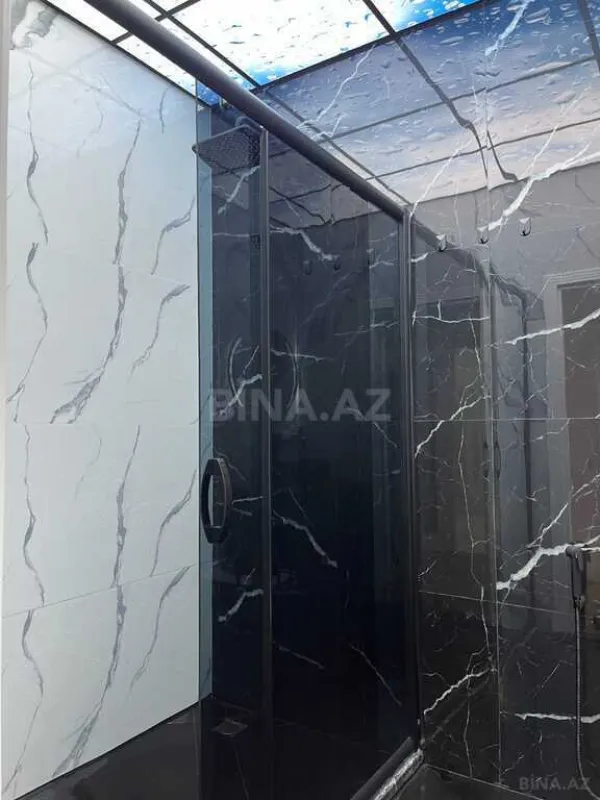 Satılır 4 otaqlı mənzil 155 m²