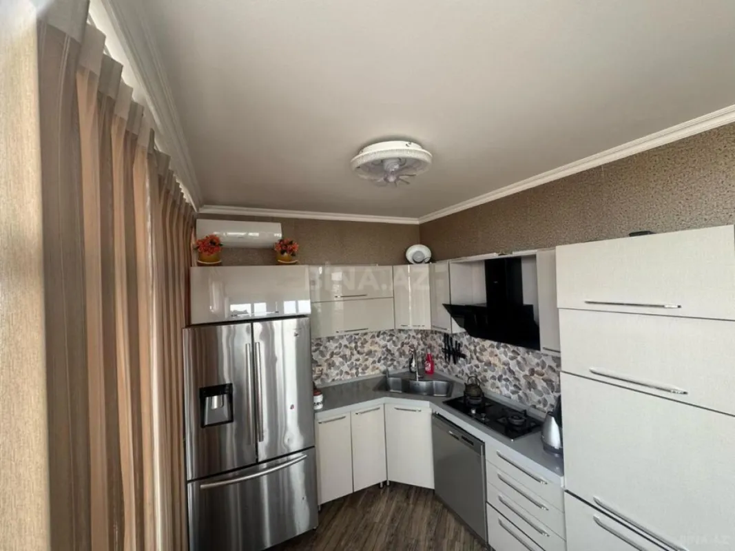 Satılır 4 otaqlı mənzil 201 m²