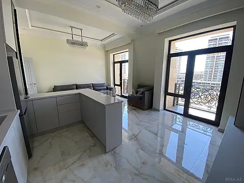 Satılır 4 otaqlı mənzil 121 m²