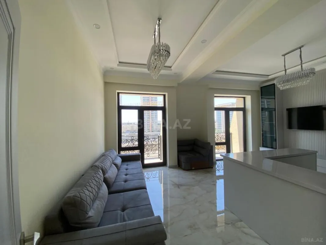 Satılır 4 otaqlı mənzil 121 m²