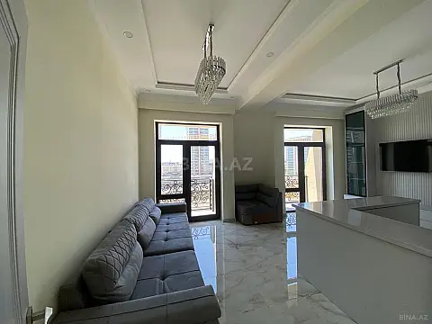 Satılır 4 otaqlı mənzil 121 m²