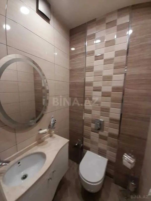 Satılır 4 otaqlı mənzil 205 m²